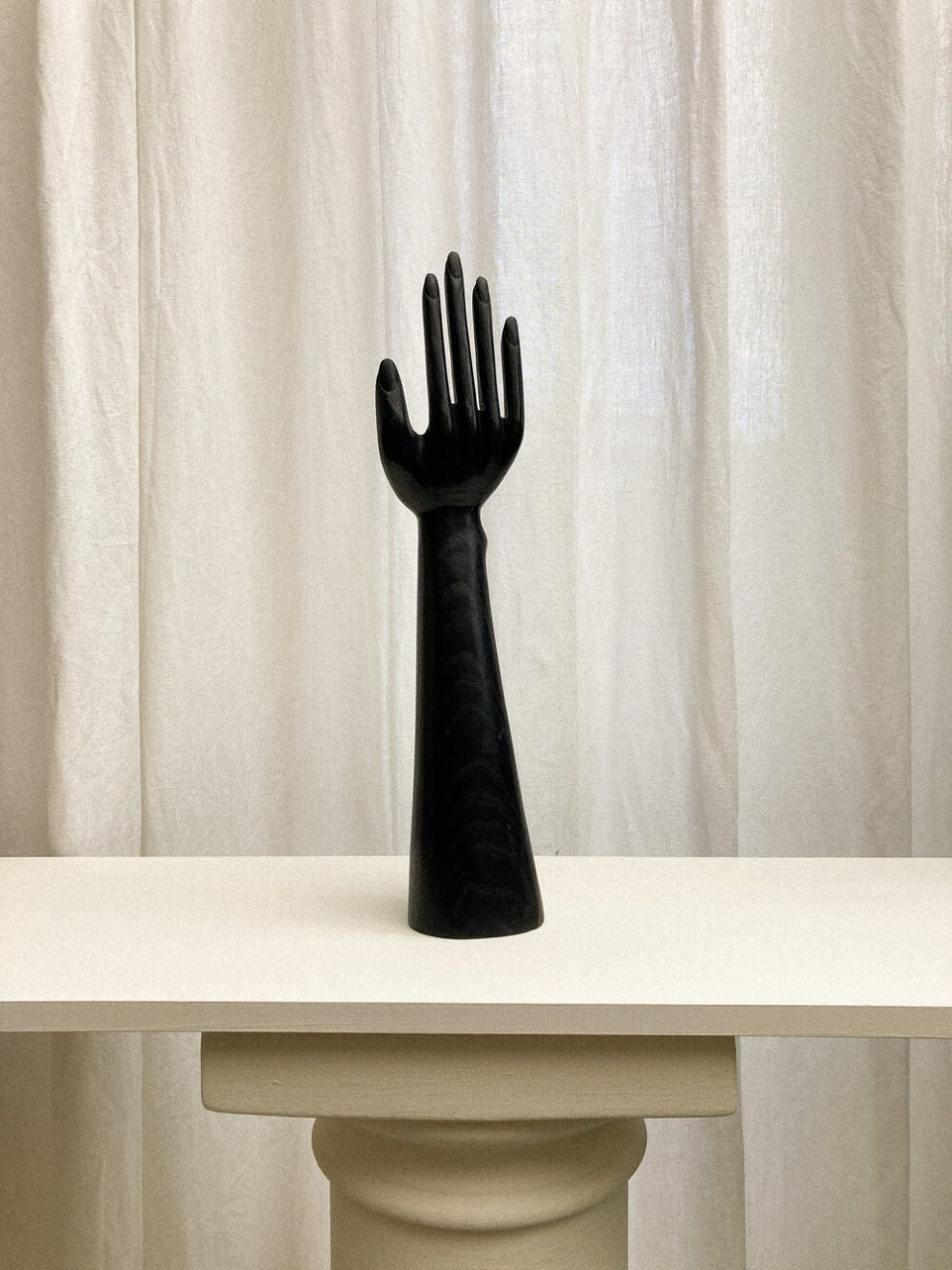 ebonised-wooden-hand-sculpture-shop-mantel-sadie-perry-aucoot-estate-agents